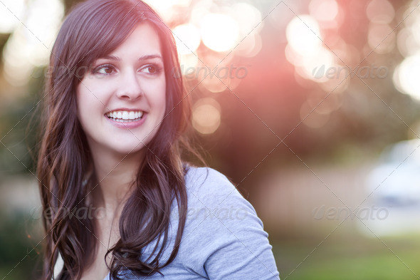 A portrait of a smiling beautiful woman