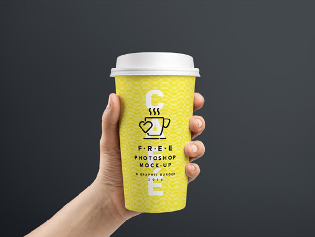 Coffee Cup In Hand MockUp