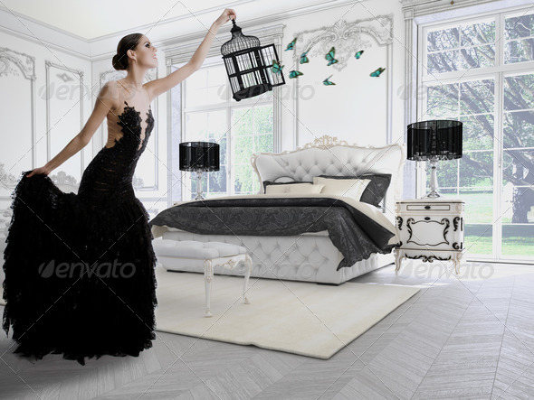 Glamorous Woman with a Cage in Modern Look 