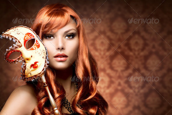Romantic Look of Beautiful Woman with the Carnival Mask
