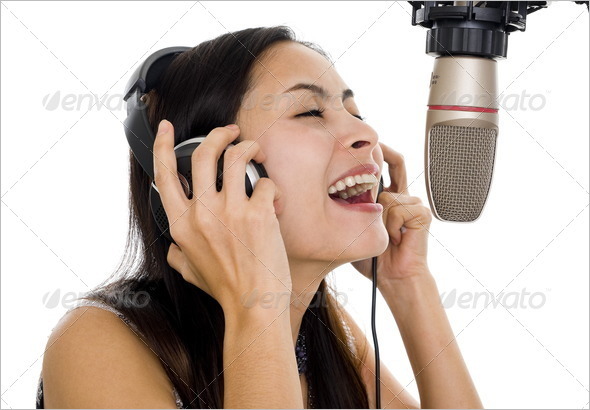 beautiful woman recording vocals in music studio, isolated on white background