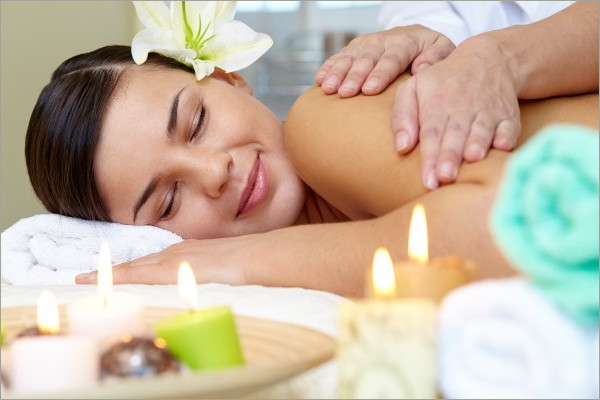 woman receiving body massage