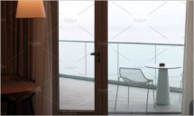 Living room with glass door balcony