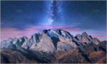 Colorful Milky Way over mountains