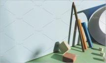 Pencil leaning against the blue wall